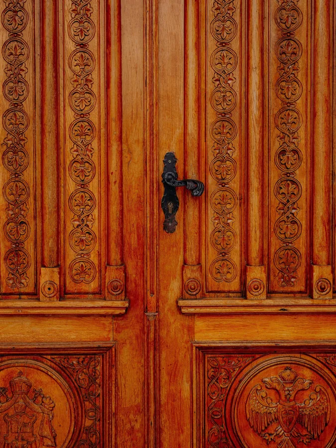 Carved Door with Heraldic Crest